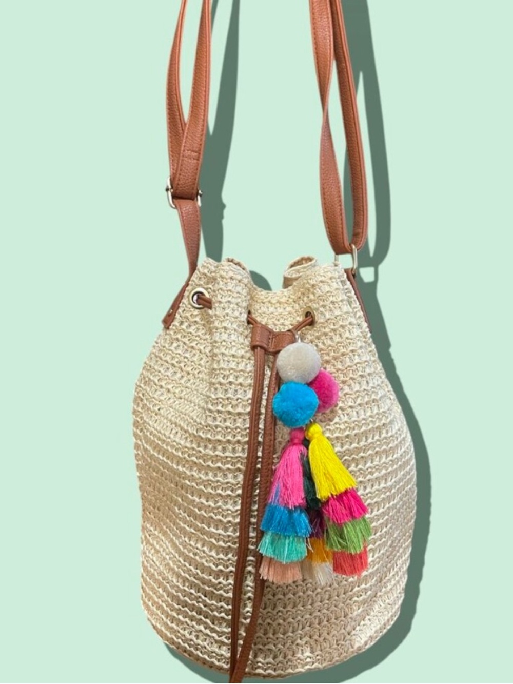 MONTCE SPRING AND SUMMER LIGHTWEIGHT BUCKET BAG WITH COLORFUL POM POM BAG CHARM
